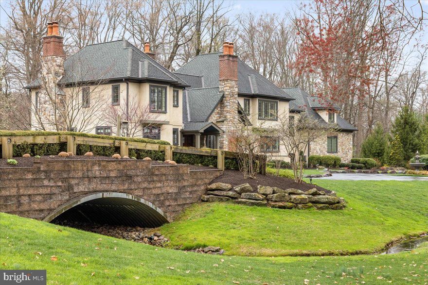 ** 4/12 OPEN HOUSE CANCELLED ** Experience the charm of this 3+ acre property from the moment you drive in over the private bridge, greeted by Heron Pond and the impressive sprawling custom home built by Trueblood Design/Build in 2009. From the great room to the private study, this home is outfitted with custom millwork, including solid wood cabinetry, sturdy built-ins, and coiffered ceilings. The home features four charming masonry gas fireplaces, plus an additional outdoor firepit, perfect for cozying up in any season. The finished basement includes a bonus room, a rec area with a custom bar, and an in-law suite, providing a private retreat for visitors or loved ones. Upstairs, you’ll find four additional bedrooms, including the primary suite, complete with an oversized ensuite bathroom and dual walk-in closets. This home is designed to grow with its owners, with the options to add an elevator and create an additional primary suite on the main floor. Whether it’s a quiet morning feeding the fish, or entertaining on the bluestone patio by the heated saltwater pool, this property offers endless enjoyment. Additional amenities include arched doorways, luxury appliances, Lutron light panels, second laundry room, pool safety cover, and more.