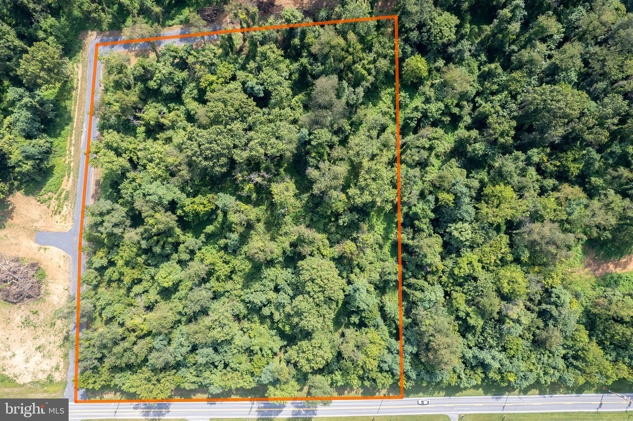Ready to build your dream home in Jefferson County? This gorgeous, level, five-acre lot, bordering Huyett and Summit Point Roads, has been perc'd for a Class I system (see documents). There is no HOA, and there are minimal restrictions on the land. Both chickens and bees are welcome! Don't miss this opportunity to own five private acres in such a convenient commuter location! Drive by and check it out today!!
Please note: The lot was subdivided from a larger parcel on Huyett Road, but it is accessible from a private road off of Summit Point Road. Please refer to the plat and directions for a better idea of the location! The private road has not been named yet.