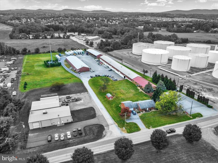 Prime Commercial Investment Opportunity
This exceptional property offers a prime location ideal for expanding or establishing a variety of commercial enterprises. The site spans approximately 6.23 acres and includes a multi-tenant commercial building, a single-family residence, and two large storage buildings—providing both flexibility and income potential.
Property Features: