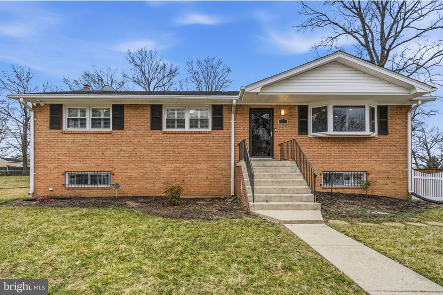 Spacious 4 bedroom, 3 full bath single-family home in Suitland offering comfort, flexibility, and a prime location. A private driveway provides convenient off-street parking, while the inviting interior features granite countertops and generous living spaces designed for everyday living and entertaining. The finished basement boasts wood flooring, a cozy fireplace, bar area, and a fourth bedroom—ideal for guests, extended stays, or a private office. A walk-up exit adds ease and functionality. Enjoy outdoor gatherings on the deck overlooking a large fenced backyard with plenty of room to relax or play. Perfectly situated with quick access to I-495 and close to Joint Base Andrews, this home blends space, style, and commuter convenience.  Photos for this listing have been virtually staged.