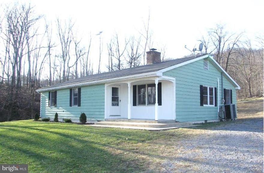 Extremely well maintained 3 bdrms.,2 bathrms. rancher with 1,730 sq. ft. on 7.5 UNRESTRICTED acres with small seasonal stream. Large eat-in kitchen with cook top and double wall ovens, separate dinning room, wood floors in living and dinning rooms plus a family room with built-in woodstove. Water treatment system. Beautiful mountain and pastoral views! Large storage shed. Priced to sell!!