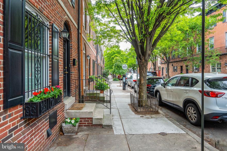 Picture perfect townhome in a prime Rittenhouse location just blocks from Rittenhouse Square park, dining , entertainment and more!  This residence is in move-in ready condition  as the current home owners recently completed some lovely renovations.  The home features 3 large bedrooms, 2 full bathrooms and one powder room.  Off the back of the home is a gracious private patio that leads to the TWO CAR PARKING.  The lower level was completely remodeled in 2017 including a new kitchen with all new appliances, new water heater and new washer and dryer.  There are hardwood floors throughout the home and a gas fireplace in the living room.
