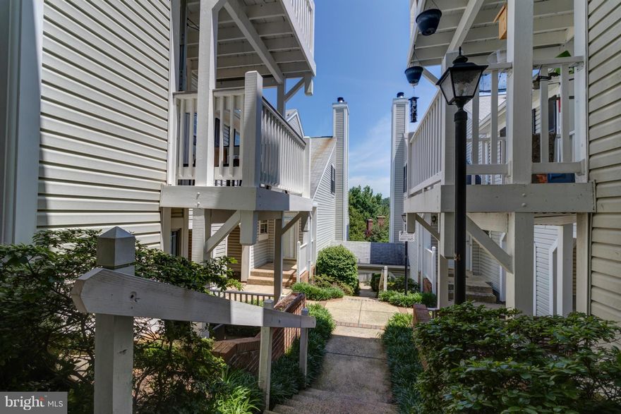 Come home to this cozy 2 bedroom, tucked-away, large unit that provides privacy and a nice community feel with a pool. Wake up to enjoy your morning coffee on outdoor patio. Large walk-in closet and double vanity sinks in bathroom. Washer/dryer in unit. Kitchen with pass-through open to living and dining room area. Two permit parking spaces. Blocks to Shirlington! No move-in fee!