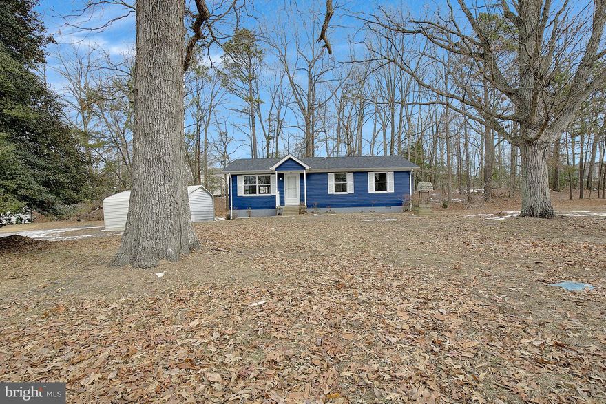 Welcome home to this beautiful renovated home with 3 nice bedrooms and 1 full elegant bathroom! Step on inside and you will fall in love with the beautiful finishes from the LVP flooring, New cabinets, New appliances, fresh paint, beautiful bathroom, and lighting.  This home offers a nice large lot with no HOA, covered parking in your very own 2 car carport, and storage in your shed. Relax out back after a long day on your porch and if you have a 4 legged friend the fenced yard will be a great feature for you.  This home also offers a nice HVAC system as well as baseboard heat for emergencies and a new roof!  This home will qualify for 100% financing no money down programs and the Maryland Mortgage Program. This beauty will not last long for this fantastic price!