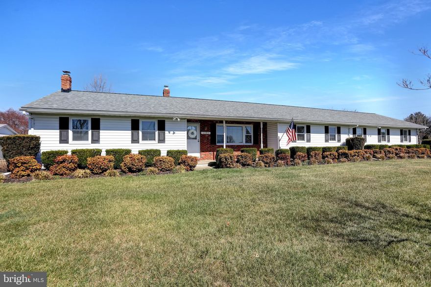 BIG PRICE REDUCTION!!!  The BEST of BOTH Worlds has just hit the market!  Need Garage Space?...This house will knock your socks off!  3 Car Attached Garage with Heat, A/C, & Water PLUS a Heated Detached 2 Car Garage with it's Own Driveway !!!  This Home Boasts a 5 CAR GARAGE...WOW!!!  Step Inside and you have MAIN FLOOR LIVING at its BEST!  HUGE Sunroom, HUGE Family Room, Main Level Laundry with Front Load Washer/Dryer, Updated Kitchen with Built-in Pantry, Stainless Appliances, Hardwood Floors, Tons of Storage, Jacuzzi Tub PLUS a Finished Lower Level with Possible 4th Bedroom/Office/Craft Room, Pellet Stove & So Much More!  Freshly Painted & Many Upgrades Throughout -  All you have to do is move right in!  Quick Settlement Possible!  Fantastic Location on a corner lot, rural yet close to town and amenities!  The Perfect Package!