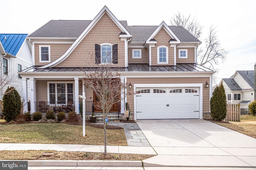 Welcome to the heart of the Williamsburg neighborhood, where luxury and convenience meet urban living! This luxurious 4 story, 2015 craftsman style home is waiting for you! Complete with five bedrooms all with ensuite baths, this home features a spacious open floor plan ideal for everyday living as well as more formal entertaining. This home offers over 5,000 sq ft of gleaming hardwoods, high-end detailing, custom millwork, and top-brand finishes throughout. The gourmet chef's kitchen is well-appointed, boasting a spacious center island with a prep sink, Carrara marble countertops, and stainless steel appliances. The lavish master suite, complete with his and her walk-in closets, creates an ideal retreat offering a free-standing soaking tub, separate shower and his and her vanities. The top floor offers a variety of possibilities from a children's play room, to a family movie area or the perfect work from home space. The walk-up lower level is well-equipped to host any game day event or party with a large recreation room, custom built-in wet bar, and guest suite. The outside space offers a welcoming covered front porch, flagstone patio, flat fenced-in backyard, and newly landscaped yard. The oversized two-car attached garage is conveniently connected to the mudroom offering plenty of closet space and a powder room. This home is less than one mile to the East Falls Church Metro, minutes to the Williamsburg Shopping Center, and convenient access to 66, 495, and the George Washington Parkway, and only a short commute to McLean, Tysons Corner, and DC. Not one detail has been missed in this house - you wont want to pass on this opportunity!