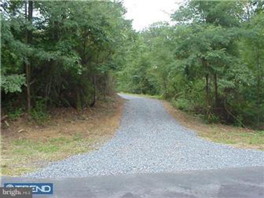5408224 Make an offer on this beautiful wooded building lot and forever enjoy the great outdoors. Less than 2 miles to Rte 183 affords a short commute to Reading for employment and gives you more time to enjoy the wildlife. View this uniquely sloped & wooded residential building lot. Situate your kitchen to the rear of your home and marvel at the sun setting in the west while enjoying a delicious dinner. Situate your living room to face the east and study nature at its finest.  Your front porch can cover the walk out basement access to your finished lower level recreation room. Walk along the trickling stream & enjoy the natural wooded corner lot.  Drive back the already installed gravel drive and you'll want to create a pleasant home nestled into the surroundings.   Minimum of upkeep on this preserved natural environment.  Septic design for a three bedroom home is included. Bring your builder for a preview.