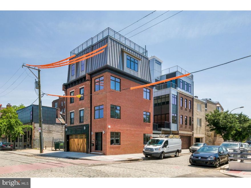 Welcome to the suburbs in the city! Get ready to wake up to the peace and quiet of the suburbs in the City! The past meets the present at AGA Developer's highly anticipated Janus Estates in Old City. A rare opportunity to own a luxury, 97% restored historic carriage house built by one of the city's most reputable developers. Ideally located in a quiet enclave of historic Old City, this 4 story property will feature 3 bedrooms, 4 full baths, 3 half baths and 2 car garage parking. This extra-wide home offers over 3,900 square feet of plush living space that will be drenched in the finest finishes; including custom cabinetry imported from Italy's Linea Quattro, Subzero, Bosche & Wolf professional series appliances, Porcelenosa stone/tile package, custom hardwood flooring throughout, LG Washer/Dryer, iPad based smart home technology/security system with camera. This home is loaded with premium finishes. The entire 4th Floor is a dedicated Master Suite w/ spa-inspired bathroom complete with soaking tub and oversized shower, walk-in closet and private balcony. The finished lower level will be the perfect extra bedroom/home office/media room complete with full bathroom. The home has a   inch porcelain tile roof deck paver system with 360 degree views of the city, pilot house w/ wet bar and powder room. Even more amenities include heated floor in all full bathrooms, nest thermostats, 2 zoned heating and cooling and speakers throughout, including the roof deck. 10-year tax abatement included as well as a 1-year builder's warranty. There are no HOA fees!