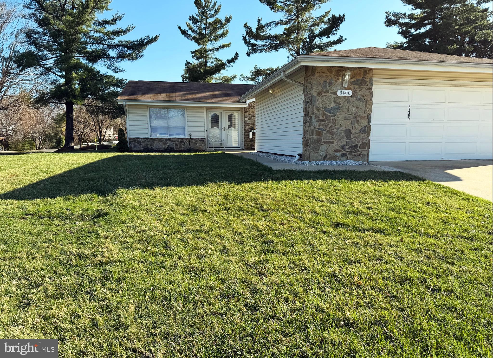 Back up Offers are Welcome. Leisure World's rare offering of an upgraded Barstow model patio home, on a corner lot of cul-de-sac, stone/siding semi-detached, shaded, all new landscaping surrounding this exquisite lot. Mutual 16, is regarded as a highly sought after community boasts a 3 bedroom, 2 full bath, one floor spacious living and patio area and a 2 car garage is perfect for vehicles and storage. The sunroom/sliding glass door patio, carpeted, high quality ceiling fan with views to common areas, trees and Clubhouse 2.
This home invites versatile living, entertaining options with a semi open kitchen of all new: lighting, appliances, dramatic, tall, shaker, white cabinetry complete with soft closing, rev-a-shelf ease, high premium white/black heat, scratch resistant, granite countertops.
The living room, dining/sun/breakfast room flow with natural light. Throughout the house is new luxury vinyl, all new lighting, Sherwin Williams Emerald grade, fresh paint, a brand new kitchen offers the perfect space overlooking the sun/breakfast room. The primary owner's suite, the two additional bedrooms all offer expansive lighted with dimmers, closet space with optimal organizers and upgraded baths. The laundry room is highly accessible. The condo fee includes all electric and water and offers so many amenities, recreations facilities, lawn care, cable, internet! Enjoy the gatherings, golf course, clubs, fitness centers, pools, shows, club house restaurant, medical care center and many other opportunities to be as active as you want in everyday activities offered at Leisure World.