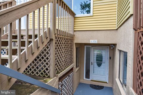 Photo of 11376 Laurelwalk Drive #B-51, LAUREL, MD 20708 (MLS # MDPG2197384)