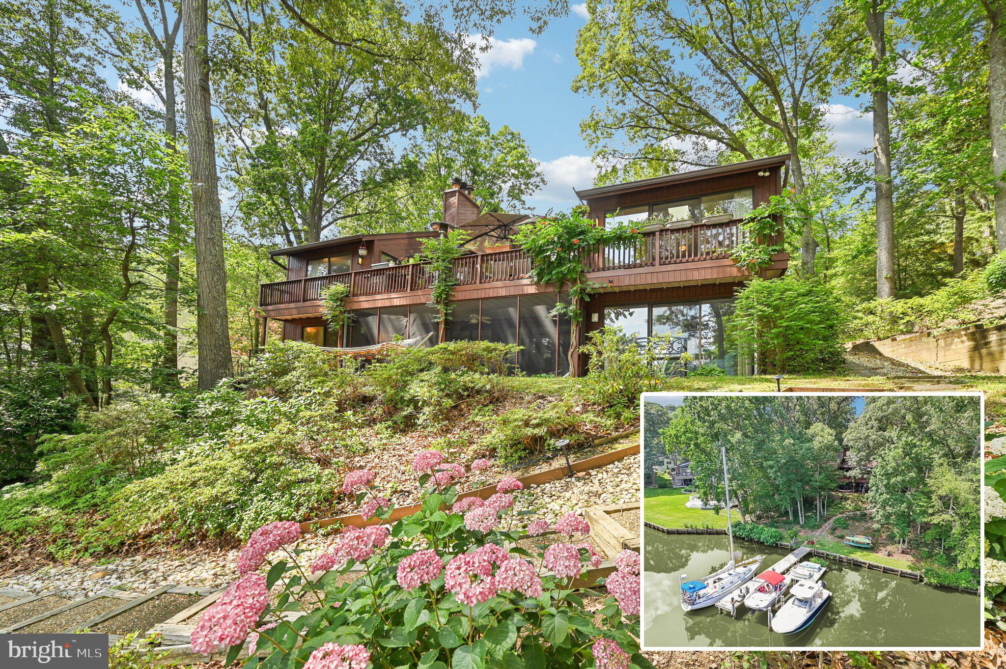 This light-filled 4-bedroom, 3-bath home offers water views from nearly every room, thanks to seven high-quality skylights and a wall of sliders along the waterside. You'll love the expanded, and totally renovated kitchen, two wood-burning fireplaces with gas starters, and hardwood floors where carpeting once was.
Follow a gentle path down from the house to your private pier with two slips, a boatlift, a floating dock, and an environmentally-friendly water garden. The oversized two-car garage includes storage shelving. Recent updates include roof, skylights, gutters, kitchen, two bathrooms, water heater, exterior French drain, and more. Hard-wired internet ensures strong connectivity, and a 1-year home warranty offers added peace of mind. Enjoy all Berrywood has to offer (voluntary HOA)—two marinas, a boat ramp, pool, clubhouse, lighted tennis courts, playground, basketball and open fields—all within the highly sought-after Blue Ribbon Severna Park school district.