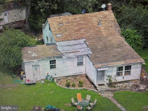 Photo of 25219 Elk Lick Road, CHANTILLY, VA 20152 (MLS # VALO2134196)