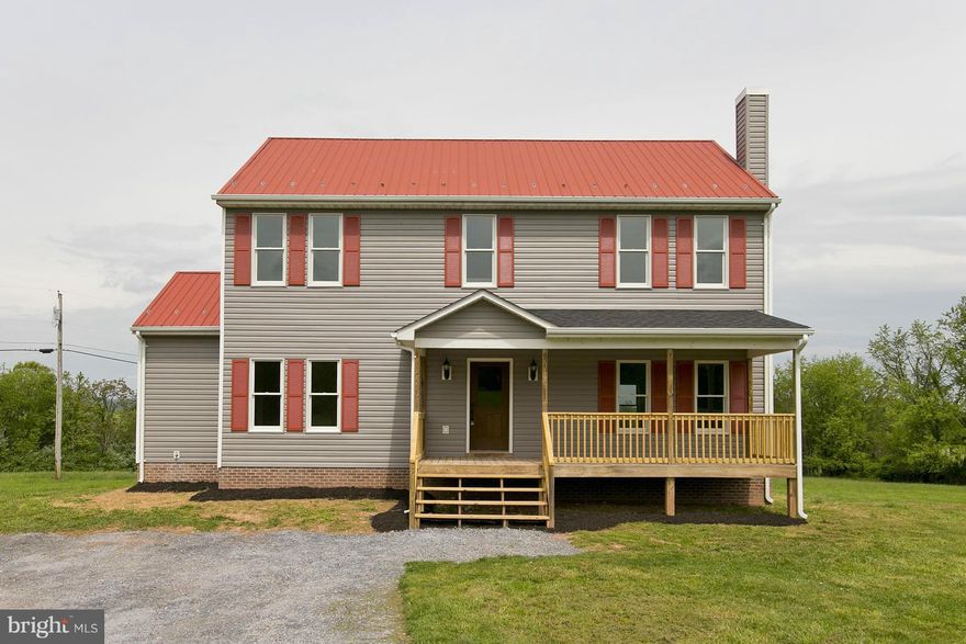 Beautiful move in ready colonial on 4.5 acres with mtn views just over the VA/WV line. 10' ceilings on main level, master bedroom w/ en suite on main level, custom kitchen cabinets, vaulted ceilings in foyer, metal roof, large unfinished basement. There are all new appliances, windows, flooring, paint. Bring your animals and enjoy the country life less than 30min to Winchester and/or Wardensville.