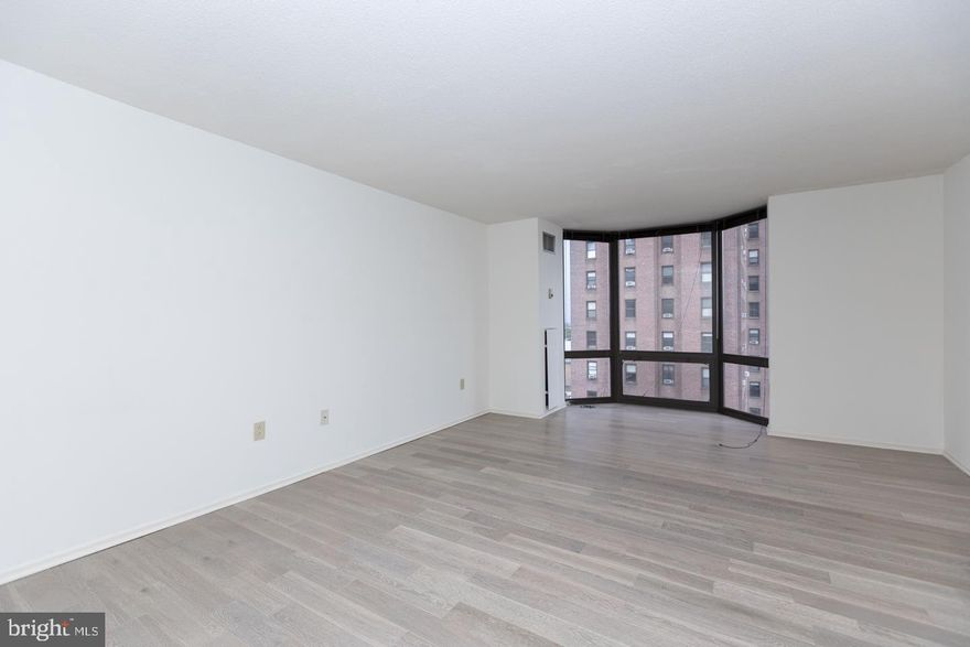 Sun-filled, updated studio with see-forever southwest city views at Wanamaker House, steps from Rittenhouse Square! Enter through a foyer with large coat closet into the generously sized living area with a floor-to-ceiling bay window providing beautiful natural light and sunset views. Adjacent is an updated kitchen with cherry wood cabinetry, granite countertops, and stainless steel appliances. There is a separate dressing area with large wall closet and updated wood vanity with granite top that leads to a bathroom with tub shower. The home has hardwood floors and excellent closet space throughout. Residents of Wanamaker House enjoy a 24-hour doorman, a seasonal rooftop pool, a fitness center, and a parking garage available for an additional fee (subject to availability). All common areas were recently renovated including the lobby, hallways, meeting room, amenity lounge, and fitness center, designed by world- renowned architect Cecil Baker. Rittenhouse Square is ranked the 6th best neighborhood in North America by Place Rated Almanac. There are 175 restaurants and 199 retailers within a three block radius. It is within close walking distance to the Market Street office corridor, The Avenue of the Arts and University City. 30th Street Station and Philadelphia International Airport are only minutes away.