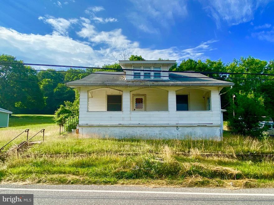 Single family 2BR/1BA home on a total of 2.64 country acres in Pine Grove. First floor has two bedrooms, living room, kitchen,  full bath, and laundry room. Large walk-up attic has the potential for additional bedrooms/living space. One car oversized garage offers additional storage; basement is unfinished. Lot is primarily wooded and includes a large shed. Property needs work but has potential.