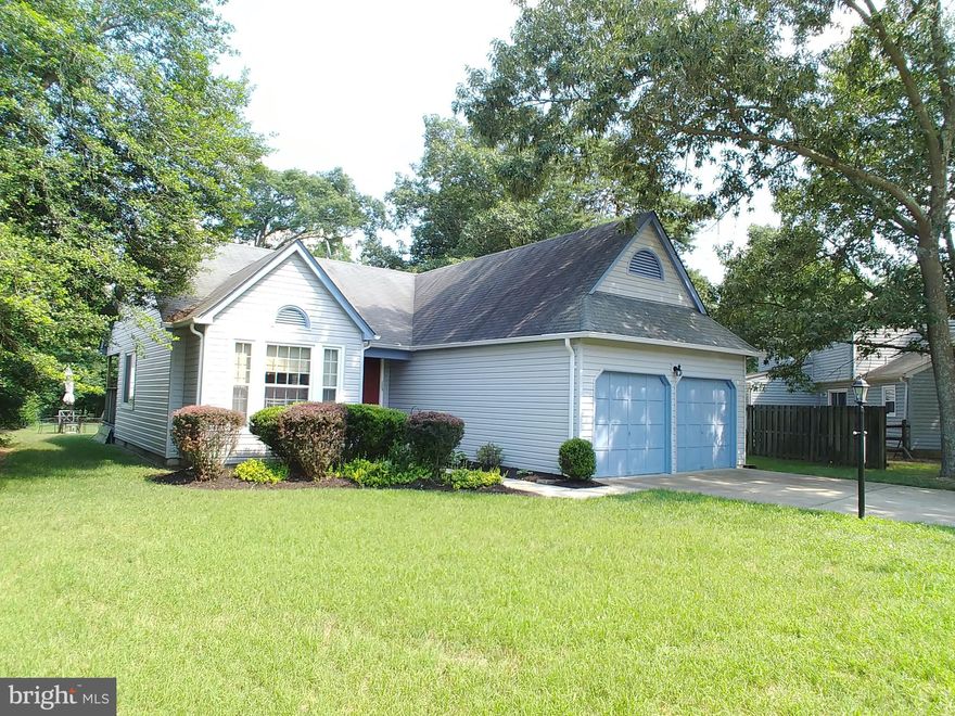 Enjoy this city close, country quiet roomy rambler with an amazing back yard, vaulted ceilings, and a rear porch deck for the lazy days of summer. This one level home features hardwood floors, 2 car garage, and a community pool to enjoy. If privacy and serenity are what you're searching for, welcome home!