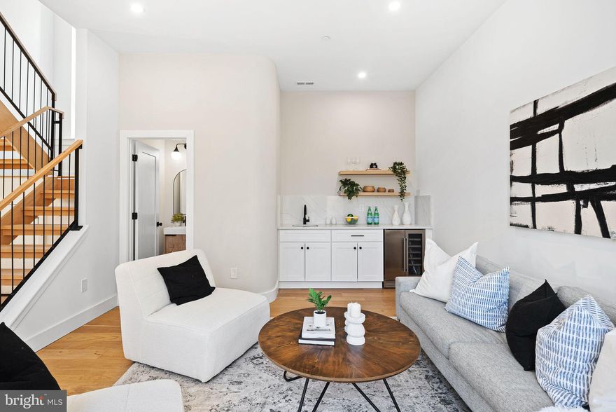 Welcome to 4315 Boone Street, a meticulously crafted, new construction home in the heart of Manayunk. Perfectly situated on a large 32 x 70 foot lot this luxury townhome offers an expansive & functional design, w/over 3,500+ square feet of thoughtfully crafted living space. Boasting 3 spacious bedrooms and 3.5 modern bathrooms, it’s perfect for comfortable, easy living and entertaining. The open-concept floor plan flows seamlessly throughout, with an abundance of windows offering an incredible glass to square foot ratio for natural light. One of the standout features of this home is the stunning roof deck, providing breathtaking views of the city and a perfect space for relaxing or hosting guests. Additionally, the home includes an oversized 1 car garage for convenient parking and several other private outdoor spaces, allowing you to enjoy outdoor living at every turn.  This home is ideally located, just a short stroll to Manayunk’s Main Street with vibrant and trendy bars, restaurants, and shops. You’ll also appreciate the easy access to Center City Philadelphia, just a quick drive away. For those who enjoy outdoor activities, a family-friendly park is just one block from your doorstep, providing an excellent spot for recreation and relaxation.  Designed by the renowned Morrissey Design Group, this home draws inspiration from Scandinavian design principles, focusing on clean lines, simplicity, and functionality. For your peace of mind, this property comes with a 1-year builder’s warranty and is approved for a 10-year tax abatement.  Don't miss out on the opportunity to own this exceptional home in one of Philadelphia’s most sought-after neighborhoods!