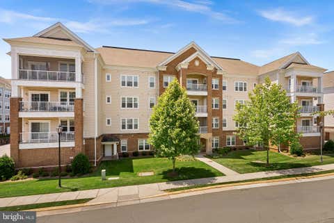 Photo of 20515 Little Creek Terrace #304, ASHBURN, VA 20147 (MLS # VALO2127812)