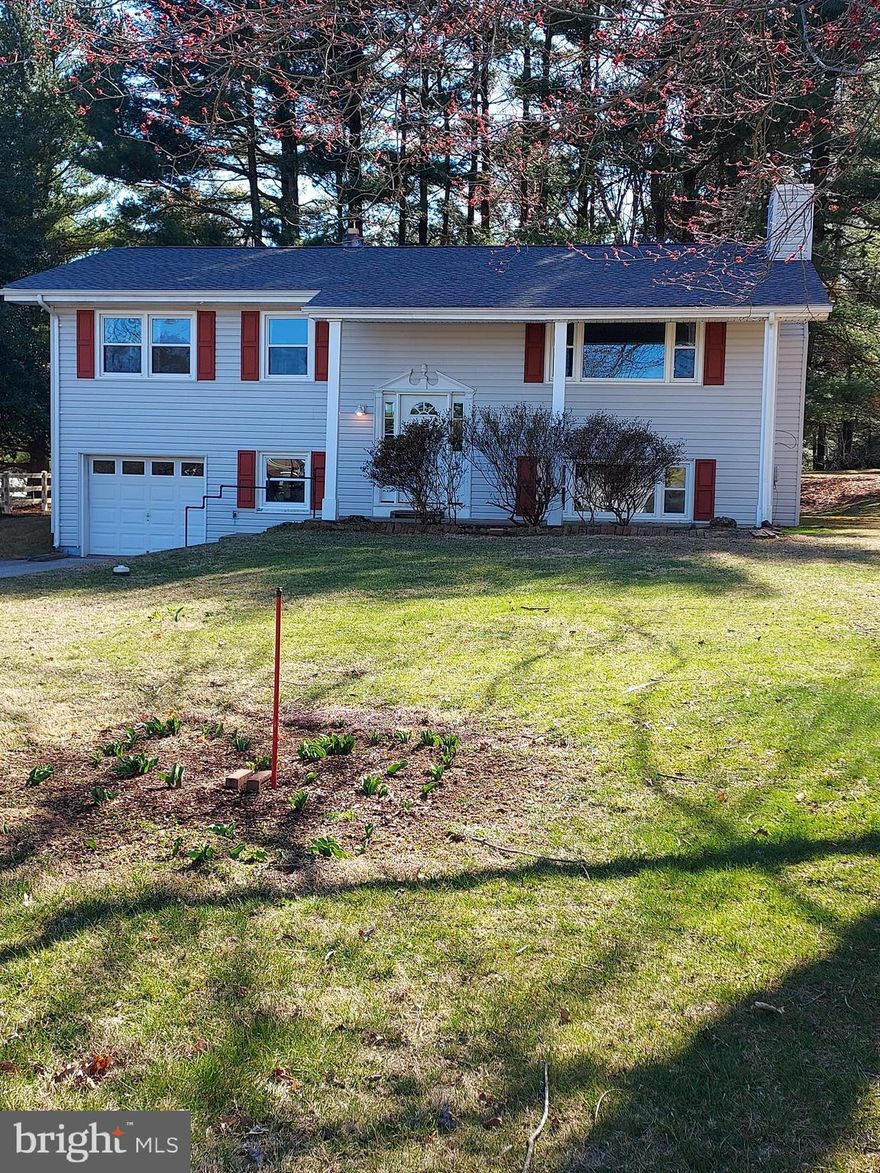 - Make appointments now on Showing time  - Please submit highest and best offers by Thursday April 6th 2023 9AM  - Contracts will be reviewed and decision made Thursday evening.  
This is a great value and is just waiting for a New Owner to make it their own.  Gorgeous hardwoods were covered for years now ready to show off.  Spacious Open Floor plan LR - DR - Kitchen for entertaining plus a cozy woodburning Brick Fireplace with mantle - Kitchen was updated in 2006 with timeless touches - Hall bath is very good size and has Linen closet within - 3 Bright Bedrooms w/Ceiling Fans - Primary Bedroom has full Bath with Shower and Pedestal sink  - Down the 2 story Foyer to Lower Level to 15x14 Family room - It needs love and a woodstove to make it an amazing room with tons of light - there is a potential 4th Bedroom/Office off the Family Room with 2 full sized windows awaiting your personal touches - the Workshop also has Full sized windows and could be finished into a 5th Bedroom - off Workshop is a Full bath that needs somelove - the Laundry room finishes the lower level and has a laundry tub and a door to rear yard with 4 step walk up - there is also a door into the 1 car garage from the workshop.   Move in ready and so much potential to make it your dream home - and have potential for even more equity - at this price this home will fly out the door - Make your appointment now!!