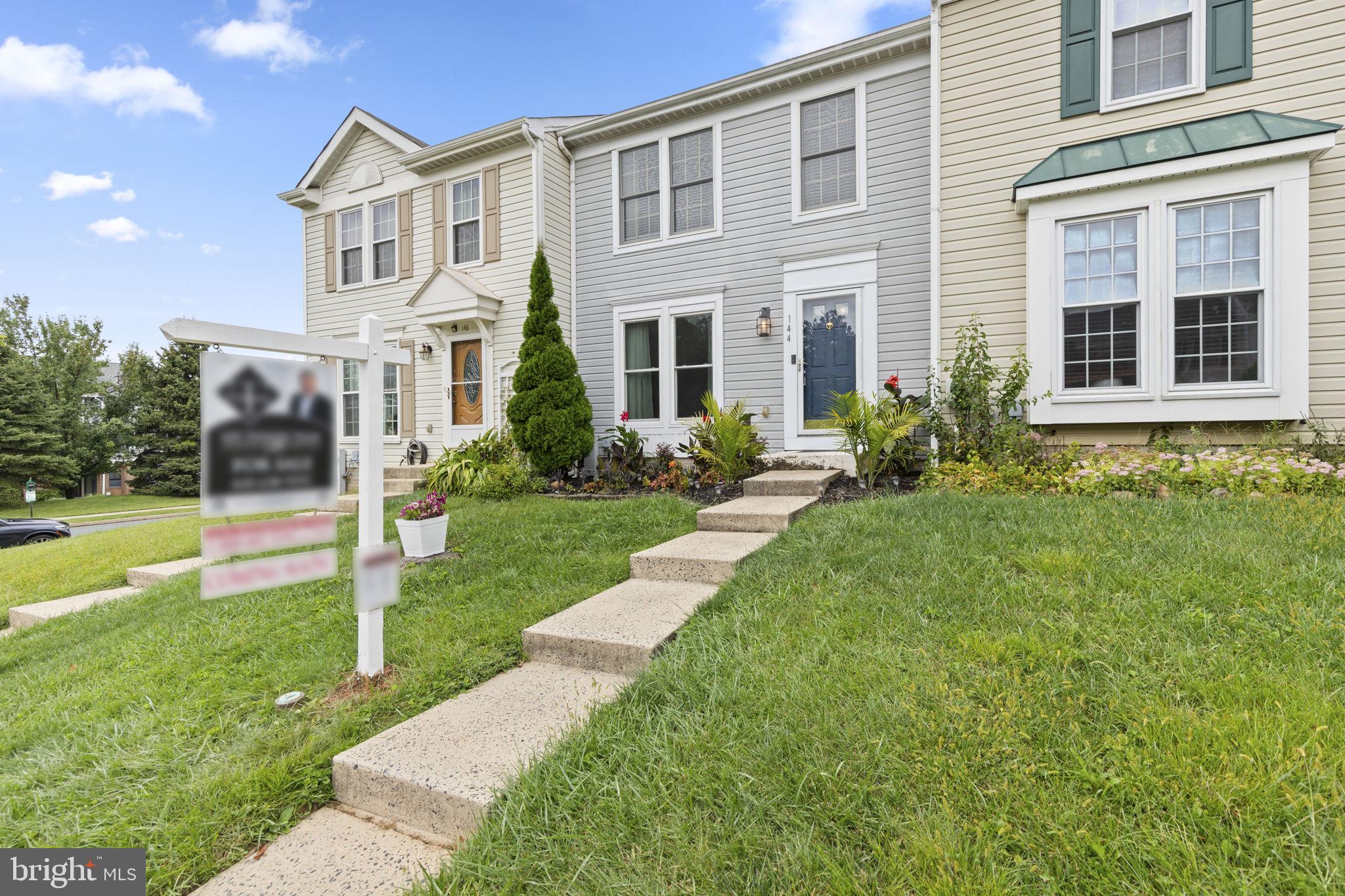 Located in the Laurel Woods community of Abingdon, this 3-bedroom, 2.5-bath townhome offers a stylish and move-in ready layout across three levels. The main floor features a bright living room with new Pella windows, while the open kitchen and dining area include white cabinetry, tile backsplash, updated lighting, and a breakfast bar. From this combined space, a sliding glass door opens to a deck with pergola and lights—an inviting spot for relaxing or entertaining. A half bath completes the level. Upstairs, the spacious primary bedroom includes a walk-in closet and direct access to a Jack & Jill bath shared with the hallway. This full bath has been upgraded with a rainfall showerhead and lighted mirror for a spa-like feel. Two additional bedrooms complete the upper level. The finished lower level expands the living space with a rustic wood door leading into the recreation room, where daylight windows bring in natural light. This level also features another full bath with rainfall showerhead and lighted mirror. A walkout opens to a stamped concrete patio, fenced yard, and shed, creating a private outdoor retreat. Additional highlights include a roof replaced in 2016, neutral finishes throughout, and on-street parking for everyday convenience. With thoughtful updates inside and out, this home blends comfort and modern living.