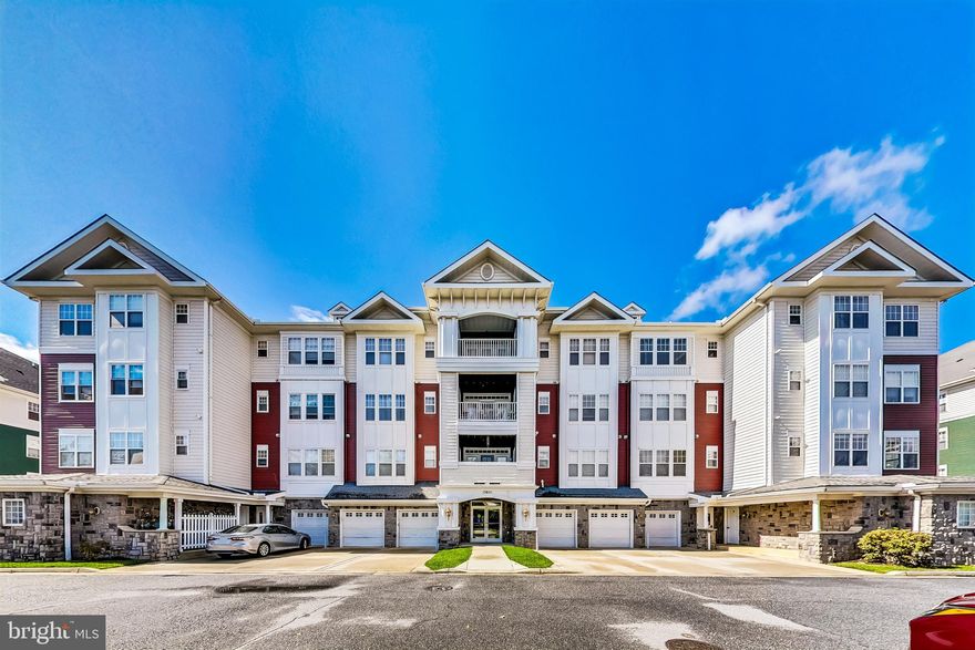 Freshly painted!! This condo is nestled in a well-maintained and upscale residential 55+ community. As you approach the building, you'll notice the modern and elegant architecture. The exterior is adorned with lush landscaping, creating a welcoming and inviting ambiance. The condo unit itself is on the ground floor, making it easily accessible with your own attached garage.   The Garage, One of the standout features of this condo is the attached and It provides secure and convenient parking and additional storage space. Plus it is one of the only garages that allows you to walk right into your apartment. 

Living Area:
Upon entering, you'll step into a spacious and open living area. The design is contemporary with neutral tones that create a soothing and sophisticated atmosphere. The windows allow ample natural light to flood the space, enhancing the overall sense of openness.

Kitchen:
The gourmet kitchen is a chef's dream come true. It features beautiful appliances.  The countertops are made of luxurious granite, and there's room for a breakfast table. A large provides plenty of storage space for all your kitchen essentials. The kitchen seamlessly flows into the dining area, making it perfect for entertaining guests.

Bedrooms:
The condo boasts two well-appointed bedrooms, one with its own en-suite bathroom. The Owners suite is spacious and features a walk-in closet. The en-suite bathroom is a true spa retreat, complete with a soaking tub, a separate shower, and dual vanities. The second bedroom is equally comfortable and has its  bathroom just steps from the door .

Den:
The den is a versatile space that can be used as a home office, a cozy reading nook, or even a guest bedroom when needed. It offers flexibility to suit your lifestyle.

Patio:
Step outside onto your private patio, which is perfect for enjoying your morning coffee or hosting outdoor gatherings. The patio is beautifully landscaped and offers a peaceful oasis to unwind.

Community Amenities:
The 55+ community offers an impressive array of amenities, including:

A clubhouse where residents can gather for social events and activities.
An indoor and outdoor pool for year-round swimming.
A well-equipped workout facility to help residents stay active and healthy.
Pool tables and other recreational spaces for leisurely enjoyment.
Landscaped walking paths and green spaces for outdoor relaxation.
Living in this condo within the 55+ community means having access to a vibrant and engaging lifestyle with a strong sense of community. It's a place where you can enjoy your golden years in style and comfort, surrounded by like-minded individuals and a wealth of amenities to enhance your daily life.