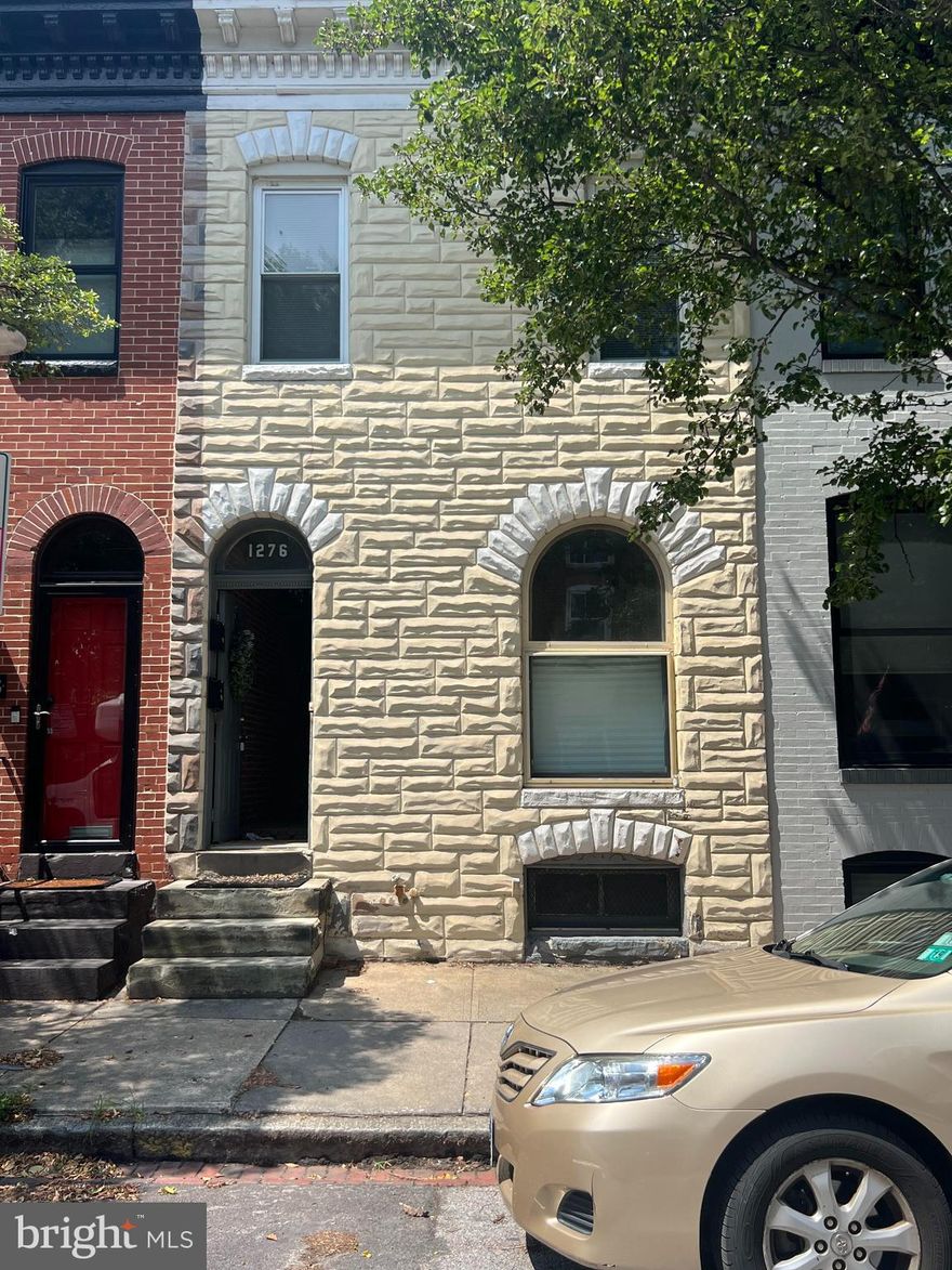 Two Units Legally metered  in Federal Hill with Parking!!  Bring your ideas this property you can build up for more profits or keep the way it is and do some cosmetic updates to rent it out. With an absolutely fabulous location you will surly love this property. Come check this one out before its gone. AS-IS Seller to do no repairs.