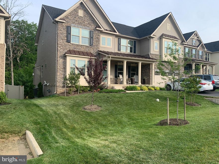 Interior photos coming soon! Highly sought after Corsica floor plan in the desirable neighborhood of Woodridge at Lake Linganore!  This home is absolutely beautiful.  At 2 years young, this home shows better than new.  No corners were cut on this build.  Everywhere you turn, you'll notice tasteful upgrades and attention to details.  At over 4,500 finished sqft, you'll have plenty of space for the whole family and more.  The finished basement, with high end kitchenette, bedroom, and full bathroom would make for the perfect in-law suite.  The list of features is too long to list on this one but include an open floor plan, custom kitchen and baths, beautiful flooring, cozy fireplace, AND a custom built screened in / covered back deck overlooking the AMAZING lot.  Backing to forest and trails, all the neighborhood amenities are truly steps away.  You can head to the beach, pools, concerts, food truck festivals, tennis/basketball courts, playgrounds, and more - all without leaving your neighborhood.  It truly feels like a far away resort, yet your minutes to downtown Frederick, major commuter routes, shopping, dining, and entertainment.  Don't hesitate, this one is sure to fly off the market.