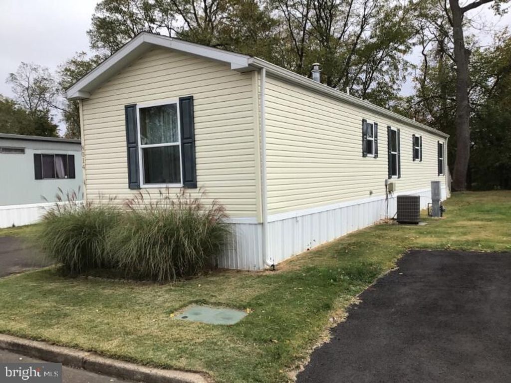 Photo of 8014 Woodside Drive, MORRISVILLE, PA 19067 (MLS # PABU2109476)