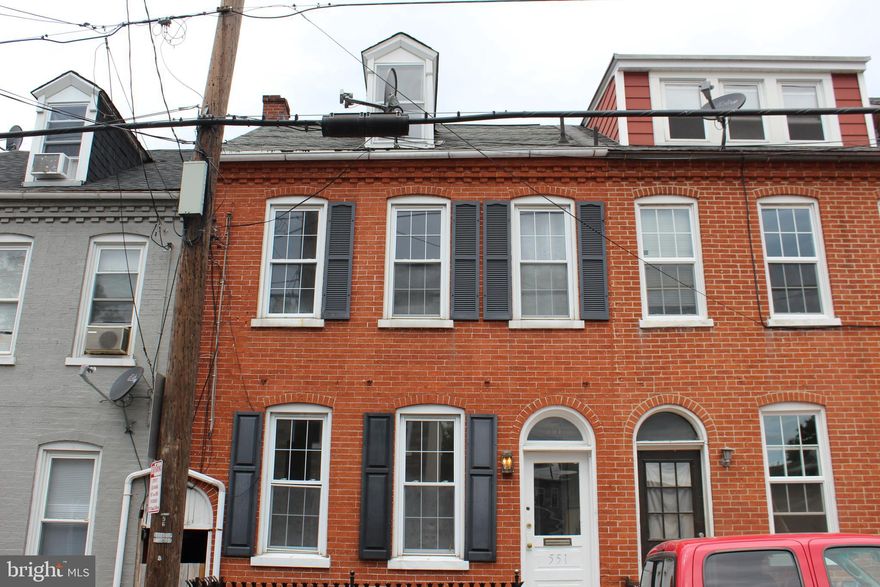 This 2.5 story row home with brick exterior offers 4 bedrooms and 1 bathroom. Close to schools, shopping, entertainment and public transportation. Repairs and updates are needed. Sold as is.