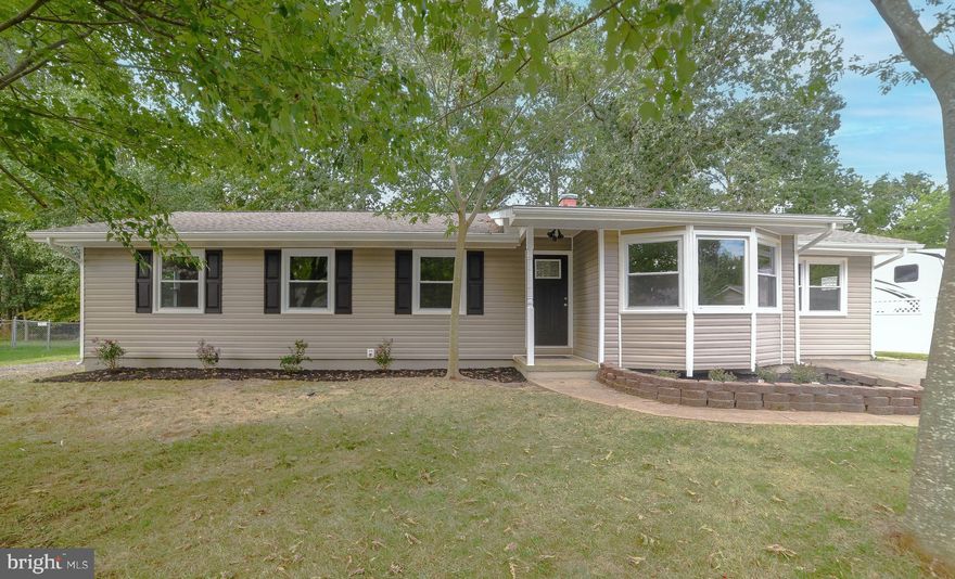 Welcome to your new home in a peaceful neighborhood with no HOA! This charming rambler boasts modern upgrades throughout. As you step inside, you'll notice the bright and airy living area and beautiful hardwood floors. The natural light streaming in from the windows further enhances the cozy ambiance of the space. You'll love cooking in the this kitchen featuring stunning granite countertops and brand new stainless steel appliances. The home features four nice sized bedrooms. The two bathrooms have also been updated to include modern fixtures and finishes, adding to the overall appeal of the home. Enjoy the outdoors with the large deck or gorgeous screened in porch. Two sheds will give you plenty of storage options. Two separate driveways provide ample parking for cars, boat or RV. Don't miss out on the opportunity to make this lovely home yours. Schedule a viewing today and experience all that this property has to offer!