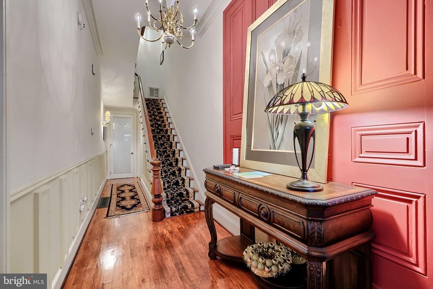 This property has a 3% assumable VA loan. 48  hour notice - Please call Listing Agent to schedule showings. Investor’s Dream in Bolton Hill – 1404 Park Avenue. This is a listing agent must accompany listing. Please arrive at the time you book your showing.

Unlock exceptional income potential with this rare multifamily opportunity in the heart of historic Bolton Hill. Ideally located near MICA, the University of Maryland Medical Center & Campus, and major public transit lines, 1404 Park Avenue offers the perfect blend of character, convenience, and cash flow. Gleaming hardwood floor, multiple fireplaces, soaring ceilings, custom moldings, oversized windows, beautiful chandelier, private courtyard, detached garage and so much more. Basement is unfinished but has tremendous potential as additional space. 

 Live in one unit  and lease the others, this flexible property delivers. Each of the units features its own full kitchen, laundry room, and private entrance, ensuring comfort and privacy for every resident. The Owner’s Suite occupies the entire first floor, boasting soaring ceilings, ornate crown molding, a fireplace, spacious family room, and a large eat-in kitchen—a charming space with timeless elegance. Outdoors, enjoy a private courtyard, detached garage, and stunning architectural features like a historic central staircase that speaks to the home’s classic charm.

Perfect for traveling nurses, medical professionals, and arts students, this property checks every box for a high-demand rental in one of Baltimore’s most sought-after neighborhoods.

Don't miss your chance to own a piece of Bolton Hill with unbeatable versatility and long-term investment upside.

Unit 1 - Owners Suite - Entire first floor & part of second floor  - Owner occupied  - Two bedrooms, plus garage, and court yard. 
Unit 2 - 2nd Floor Rear - Tenant in place - Month to month lease - 1300.00  - One Bedroom
Unit 3 - Top Floor - Tenant in place through October 2025 - 1500.00 - One Bedroom