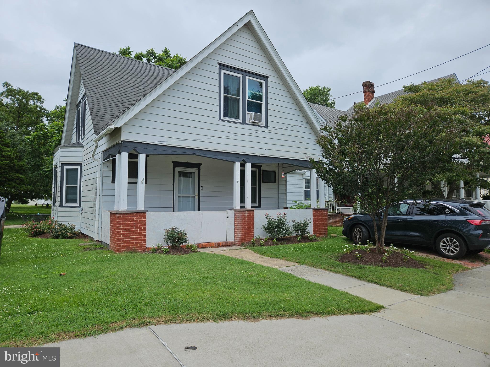 Small town location and close to SO many amenities - enjoy the best of both worlds! Great location in town and just around the corner from stores, restaurants, elementary school and more. Water access isn't too far away (about 5 minutes, if that!). The seller has done many updates since purchasing 3 years ago -- all new appliances, windows, front door, landscaping, refreshed painting throughout and more. There is room downstairs for a bedroom if desired (currently used as office space). Front porch; spacious backyard with patio and mature trees; town park is just about a block away. This home and property have a lot to offer!
