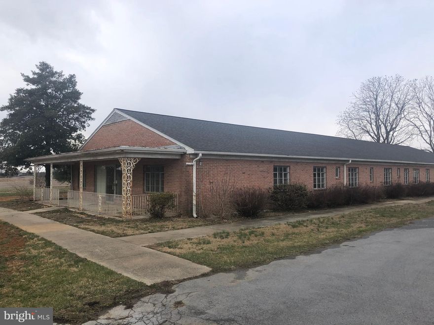 Commercial building with great potential!  Former assisted living facility offering over 13,000 square feet on 2.37 acres.  Building is located off Downsville Pike within minutes of Interstate 70 and 81.  New Septic and electrical system upgrade.  Zoned RB-E.  No City taxes!