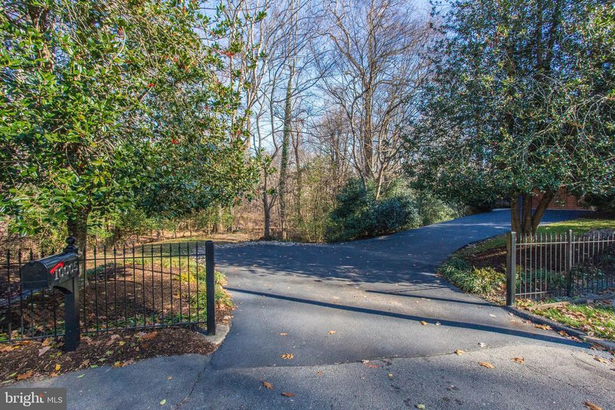 Estate-Like Setting    Hidden Treasure   nothing else like this rare ultra-private, secluded  wooded paradise at the end of a dead-end street and adjacent to Fairfax County parkland complete with a meandering stream.   Rare 34,016 sq. ft. lot (three-quarter's + of an acre) a quick walk to Laurel Ridge Elementary,  walking distance to Robinson Secondary School and handy to three neighborhood community swimming pools (approximately $400.-$500 per year); No Homeowner's Association.   Comfortable sunny Colonial with roomy front porch and expansive rear deck    both ideal for slowing down and soaking in Nature's glorious displays.  Welcoming heart-of-the-home kitchen has table space as well as access to appealing rear deck...all adjacent to Family Room with handsome cozy gas fireplace.   Separate formal Dining Room for gracious hosting of friends and family   four just-right-sized bedrooms and two full baths on the upper level provide plenty of private space and closets.  Generous driveway and attached main level two car garage.   2,478 finished sq. ft. on main and upper levels plus even more finished space in versatile walk-out lower level   space currently used as 5th bedroom, third full bath (visitor/au pair hide-away?) and abundant storage.  Express Bus to the Pentagon and easy access to what you need and want.