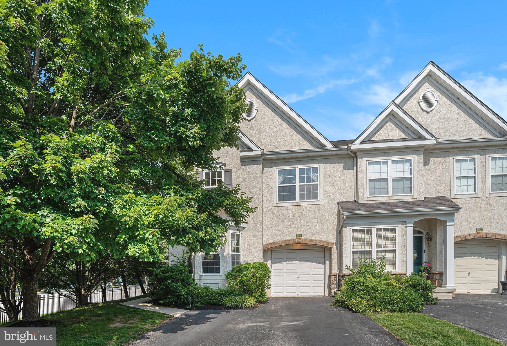 Beautifully maintained end-unit townhouse on a quiet cul-de-sac in the desirable Hill View Community. Features an open floor plan with hardwood floors, formal dining room with bay window, and large eat-in kitchen with island and sliders to a nice deck. Two-story family room offers abundant natural light, a gas fireplace, and custom motorized blinds. Living room with second bay window and first-floor powder room. Upstairs, the spacious primary suite includes a walk-in closet and large bath with jetted tub, double vanity, and stall shower. Two additional bedrooms, hall bath, and second-floor laundry. Finished basement with half bath and storage. Newer roof. Convenient to Routes 476, 76, 202, shopping, and Plymouth Community Center.