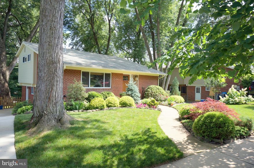 OPEN SAT., SEPT. 13, 1-4  Four level split with Sunlight on all levels!  Superbly maintained and upgraded including new windows and doors, concrete driveway, extraordinary landscaping, gorgeous trees, updated plumbing and wiring, renovated kitchen and baths, heated and covererd gutters.  Walk to G. Mason Univ, one block to updated neighborhood pool & playground. Cardinal Title = Free Home Warranty