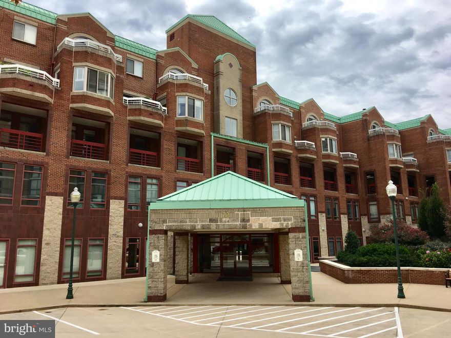 Welcome to The Victoria Condominium in the heart of Downtown Rockville—just one block from vibrant Town Square!
This beautifully south-facing, sun-drenched unit is located on the outer side of The Victoria Condominium (Building 22), offering peaceful surroundings with open views overlooking the Montgomery County Courthouses. With only two levels of residences in this mid-rise building, the setting is quiet and private—an uncommon find in such a prime urban location.
Natural light pours into this 2 BR/2BA home through two sliding glass doors and a charming bay window, creating a bright and inviting atmosphere. Step out onto the private balcony and enjoy sweeping views of historic architecture, lively dining destinations, and even a bird’s-eye glimpse of the Rockville Metro (Red Line).
The main living area features a cozy fireplace, an open window to the kitchen, and a welcoming entry. Multiple storage options—including a utility closet, coat closet, and linen closet—add everyday convenience.
The spacious primary suite offers a large walk-in closet and a private full bath, complete with a stackable washer and dryer. The second bedroom features a mirrored double-door closet and easy access to the second full bathroom—ideal for guests or a home office.
This unit includes a dedicated parking space at G-2 level and a generously sized storage cage (approx. 50 sq. ft.) conveniently located directly in front of the parking space, just steps from the elevator. Trash and recycling are located on the same floor for added ease.
Condo fee includes water, hot water, HVAC maintenance/replacement, fitness room, trash, and exterior maintenance. Special assessment has been paid off and the community is professionally managed, ensuring a well-maintained and comfortable living environment.
A true hidden gem offering comfort, convenience, and unbeatable location in Downtown Rockville!