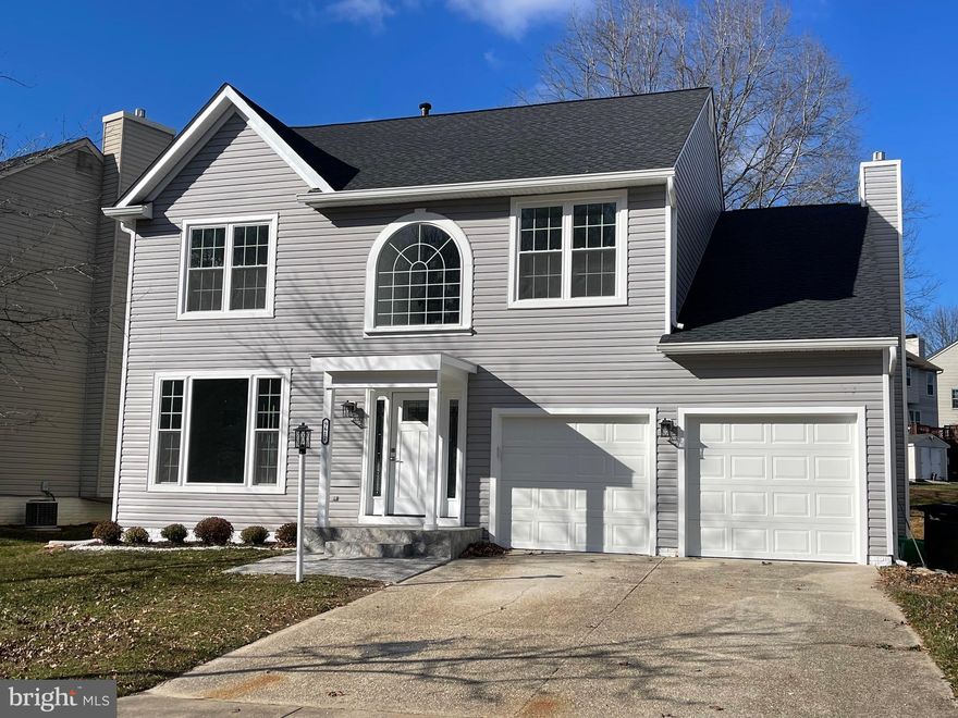 Exquisite, fully renovated single-family residence set in a highly desirable neighborhood, offering refined elegance and modern luxury at every turn. This exceptional home has been completely rebuilt from top to bottom—every detail, finish, and system is brand new.  The residence features 4 generously sized bedrooms, 2 full bathrooms, and 1 half bath. At the heart of the home is a stunning, designer kitchen equipped with stainless steel appliances, a wine cooler, and sleek contemporary finishes—perfect for both everyday living and sophisticated entertaining.  The luxurious primary suite is a true retreat, showcasing an exquisite spa-inspired bathroom with a separate glass-enclosed shower, an elegant soaking tub, and dual vanities finished with premium materials.  Additional highlights include a warm and inviting family room with a fireplace, all new flooring throughout, beautifully redesigned bathrooms, and custom wrought-iron and wood handrails gracing the foyer and second level. A brand-new roof, expansive new deck, and a two-car garage further enhance this remarkable property.  A rare opportunity to own a truly turnkey home where craftsmanship, comfort, and luxury come together seamlessly.