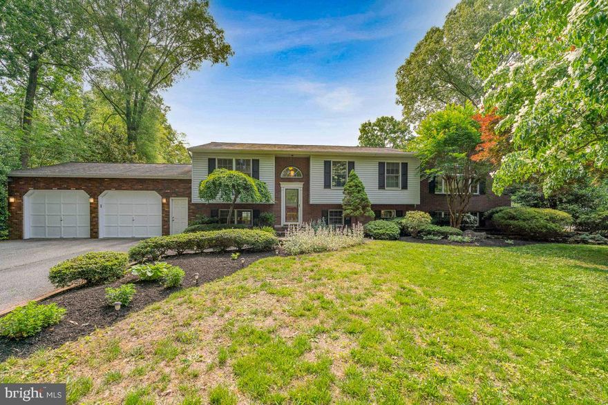 This is a MUST-SEE home with all the bells and whistles perfect for entertaining throughout the seasons and holiday family gatherings on a private 1.07 acre landscaped lot. Expanded split-foyer with high end upgrades to include  a 2 story addition and an abundance of amenities.  You will marvel at the beautiful gourmet chefs' kitchen with custom built cabinetry, hideaway dishwasher, SS appliances and an overhead skylight which brings plenty of natural lighting.. In the dining area there is a coffee/wet bar area that contains an undercounter refrigerated cooler for wine and beverages. The enormous primary  bedroom suite contains a  sitting area with fireplace, vaulted ceilings, w/w carpeting,  front and rear enormous  Palladian windows allowing a great deal of sunlight to enter.  There are two walk-in closets as you move to the primary bathroom suite with  double vanity,  large walk-in steam shower, a separate jacuzzi tub. and a European style bidet. For convenience you can utilize the laundry shoot  to save  steps to the laundry room.  Access to the  decking area is from the dining area or primary bedroom with a  large custom screened in area between the 2 open decks with ceiling fans to stay cool during the summer months. The lower level  contains plenty of finished living area as well.   You will find a family room/home office with a wet bar,  full bathroom, spacious laundry room and a large  finished area that contains a kitchenette, 1/2 bathroom  and  can be the 5th bedroom. if needed.  From the family room or the 5th bedroom you can walk out to an enormous paver patio area that contains a custom bar, hot tub, firepit and BBQ grill that conveys.. From here the pool is center stage to enjoy all the summer activities. The property  behind the pool has a double gate to conveniently park  a boat and trailer or RV.  The home contains 4 zones for heating and cooling. The property contains an underground irrigation system that conveys as-is.
With the extensive hardscape