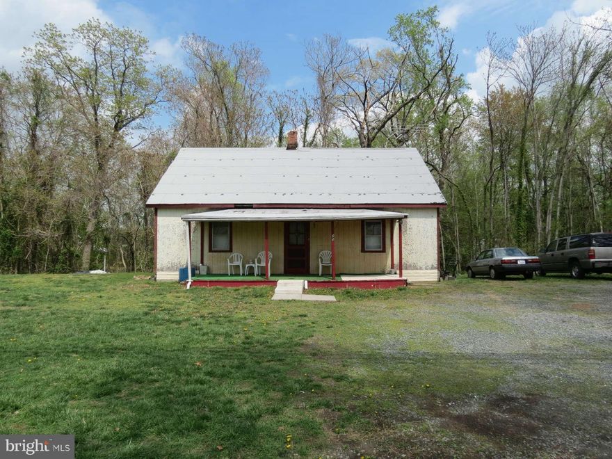 *Just reduced $30k* Approx. 3 acres just off of Rout 1 next to Aquia Town Center. Mostly wooded old house on the property has no value and please do not enter the house it is not safe.  public water, sewer and Natural gas approx to site. potential subdivision or commercial use. However, status for use needs to be verified with Stafford County