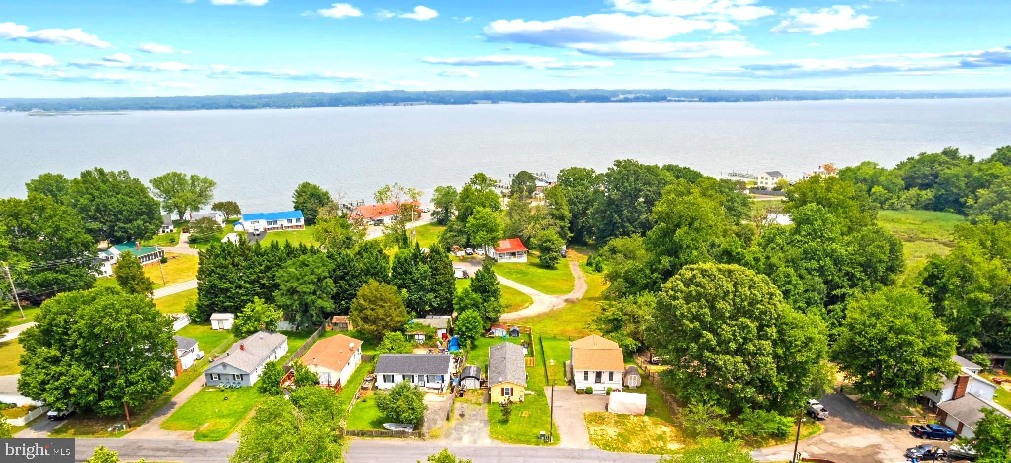 $10,000 seller credit!!!!!!! You will love this 2 bedroom rambler with seasonal views of the Patuxent River! Live near waterfront dining at Sandgates Inn and Seabreeze restaurants! This home is located in the area of Saint Marys Beach! The fenced in backyard is one of the highlights here! Current owners love watching fireworks from their own backyard during the fourth of July and other celebratory occasions. This is a great starter home with minimal maintenance! The living room was just painted white along with the hallway. Professional photos are ordered and will be added asap. Owners have been making excellent improvements! They added a smaller bathroom sink so that there is more room in the bathroom. I will add the other improvements momentarily. Be sure to check out this affordable home so close to the Patuxent River! Updates include: New HVAC sytsem only 18 months ago (approx.), bathroom renovated except for the bathtub and window, $8,000 worth of new windows installed ( 4 new windows), New well pump, Another favorite place right around the corner is Snow Hill Recreational Park! Owners really enjoy going there and having family and friends get together for picnics and great times! So much to enjoy in this area! Schedule your showing while this home is fully available!