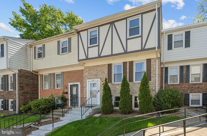 Welcome home to Hanson Oaks! This freshly painted corner townhome offers three finished levels, an impressive list of updates, and an unbeatable location for commuters. Rich hardwood flooring flows through the main level, leading you into a light-filled, generously sized living room. The adjacent dining area offers generous space for casual meals or entertaining, opening seamlessly into the updated kitchen, where bright Shaker-style cabinetry, sleek granite countertops, and a full suite of stainless steel appliances make cooking a pleasure. Upstairs, plush carpet runs throughout three generously sized bedrooms with ample closet space, served by two stylishly updated full bathrooms. Downstairs, the lower level adds great flexibility with a versatile recreation room and a fourth bedroom perfect as a private home office, playroom, or guest space. A large laundry room with a utility sink rounds out this level of the home. Step outside through the sliding glass door to enjoy a private patio enclosed by a wooden fence (2021), with lush grass kept green by an in-ground sprinkler system (2021) - all backing to mature trees for a peaceful, private setting. Additional updates include energy-efficient windows (2019), HVAC and heat pump (2020), water heater (2020), circuit breaker panel upgrade (2023), and newer roof shingles (2022). All major systems have been professionally serviced annually. A Level 2 EV charger (2023) conveniently serves your assigned parking space right in front of the home, while professional landscaping keeps the community looking its best year-round. Just minutes to Giant, Wegmans, Target, Woodmore Towne Centre, Riverdale Community Park, Northwest Stadium, NASA Goddard Space Flight Center, Joint Base Andrews, and Joint Base Anacostia-Bolling. Nestled in an up-and-coming neighborhood, this home is an ideal spot for commuters - with New Carrollton Metro, Amtrak, and MARC just one mile away and quick access to Annapolis Road, I-495, Route 50, and the Baltimore-Washington Parkway. Schedule a private tour of your beautiful new home today!