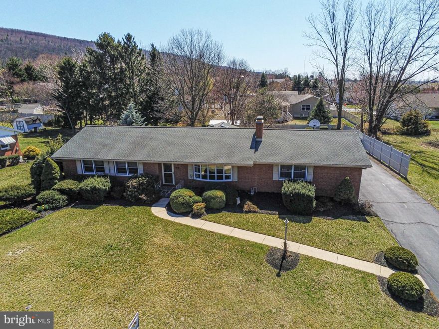 ALL BRICK RANCH...with tucked in cozy village lifestyle!  You are the lucky one!  Enjoy 2020 addition of sunroom/lounging area with laundry and mountain views!  Also, beautiful kitchen/cherry cabinetry with granite countertops and stainless steel appliances.  3 bedrooms, walk in sit down shower.  Hardwood floors.  Partially finished basement w/FP & family rm plus summer kitchen & storage.  Mature scape, garden & enclosed yard effect for privacy.  Sun setter awning over paver patio.  Macadam parking area.  Central air.  5 minutes to Penn National golf & Michaux Forest.  Conveniently located in Mont Alto, between Chambersburg & Waynesboro.  This house has many upgrades!!