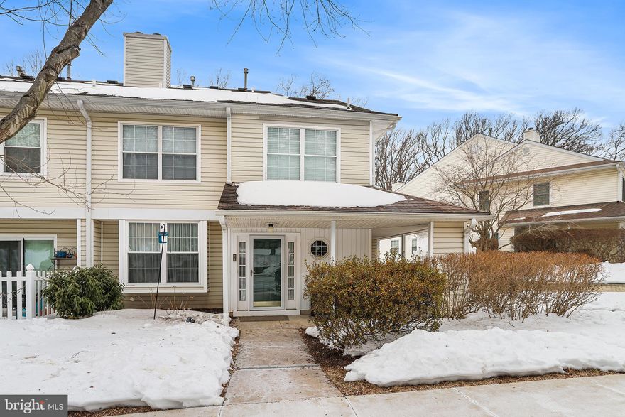 Welcome to 73 Bayberry Ct, an updated end-unit home located in the highly desirable Darlington Woods community. Walk up to the adorable wraparound, covered front porch and step into a bright, open-concept first floor. Just inside the entry, a renovated half bath and coat closet sit conveniently to the right. To the left, the living room features neutral paint throughout, recessed lighting, a warm and inviting bay window, and a newer, cozy gas fireplace. The adjoining dining area offers a sliding glass door leading to a quaint patio with an exterior storage closet, perfectly positioned just off the renovated, bright white kitchen. The kitchen boasts beautiful quartz countertops, new stainless-steel appliances, and updated cabinetry and hardware. Before heading upstairs, you’ll notice a convenient storage closet with updated mechanicals. At the top of the stairs, you’ll find a convenient laundry closet with a stackable washer and dryer and updated tile flooring. The guest bathroom features an updated vanity, luxury vinyl plank flooring, and a tub/shower combo with a tile surround. The primary bedroom is warm and inviting, featuring a vaulted ceiling, new neutral wall-to-wall carpet, windows that allow for abundant natural light, an updated ceiling fan with light fixture, and a large walk-in closet with built-in organization. The en-suite bathroom has been beautifully updated with a modern walk-in shower, updated vanity and countertop, and tile flooring. The second bedroom features durable LVP flooring, neutral paint, windows that provide great natural light, a nicely sized closet, and an overhead ceiling fan with light fixture.  The beauty of this end unit is the addition of the wrap around front porch and more privacy than many other homes in the community.  Parking is conveniently located just steps from the front door.  The Darlington Woods Community features an updated pool, tennis/pickle courts, fitness center, and well maintained and landscaped grounds that provide a quiet and peaceful setting.  This property is conveniently located near major routes, public transportation and a variety of shopping and dining options. Enjoy easy living, as the condo fee includes lawn care, snow removal, trash, recycling, and exterior building and roof maintenance.