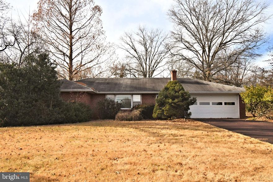 Sprawling brick ranch home with 2 car attached garage is ready for your personal touches.  Yes this home does need work, but as they say "great bones", there is a good foundation to work on.  Public records indicate 1932 square feet of living space. Features include oak hardwood floors, brick fireplace, 3 bedrooms, 2 full baths, great room, powder room, and first floor laundry room. The front door enters into a spacious living room with a brick fireplace, then on to a formal dining room, cozy eat in kitchen with adjoining  laundry room.  A large great room at the rear of the home provides a view of the rear yard, and access to a covered rear porch. The hall from the dining-living area leads to the 3 bedrooms and hall bath.  The main bedroom has its own private bath with stall shower. There is a huge hall closet for storage along with a full basement.  The attached garage has interior access to the home great for convenience and security.  This home is located near to Skippack village with all its shops and dining, plus close proximity to the turnpike interchange, Rt 422, and King of Prussia.