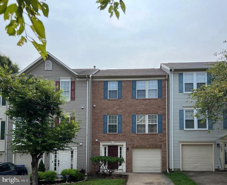 Beautiful townhome offers an open floor plan and numerous recent upgrades. The gourmet kitchen features granite countertops, upgraded cabinets, and stainless steel appliances. Freshly painted throughout, the home boasts vaulted ceilings in the primary bedroom, a spacious deck off the kitchen, and many additional highlights. Enjoy newer laminated wood flooring and a newer refrigerator. Conveniently located near a movie theater, shopping, and easy access to I-66, Route 28, and Route 29. Available immediately!