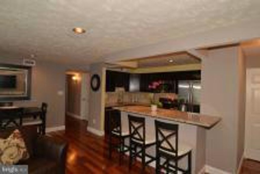 STUNNING CONDO ! ** SHOWS LIKE A MODEL !** HOME OFFERS  HARDWOODS ! **, GRANITE ! **, STAINLESS STEAL ! **, BACK SPLASH ! **, LIGHTING ! **, TILE ! , CALIFORNIA STYLE CLOSET ! **, CUSTOM PAINT ! **,  AND MORE...