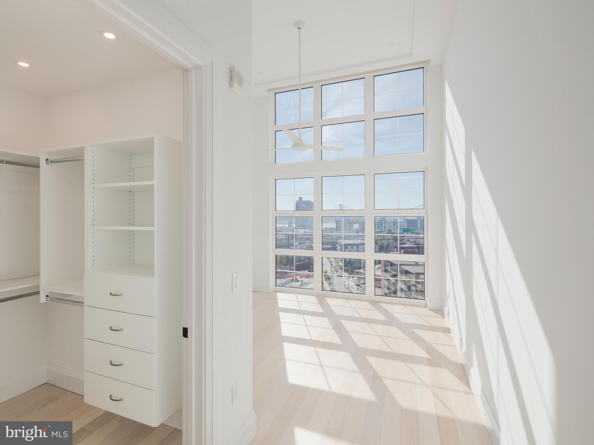The Premier Collection: a selection of newly built penthouse and bi-level townhomes at Piazza Alta, located in the heart of Northern Liberties, one of Philadelphia's most vibrant neighborhoods. These spacious residences feature sleek designs, high-end finishes, and open floor plans that blend luxury with convenience. Each penthouse was designed with majestic 13' ceilings, fluted glass white upper cabinets, pantry cabinet and best-of-the-best panel-ready appliances. Select penthouses include additional kitchen upgrades like multiple dishwashers and built-in double ovens with dual diagonal convection system.
Close to Center City, you'll enjoy easy access to top dining, entertainment, and cultural hotspots, along with world-class amenities that elevate your living experience. It's the perfect balance of urban living, neighborhood charm, and exceptional convenience. Luxury lives here.Pricing and availability subject to change. Photos are of model units. Pricing inclusive of current offers.