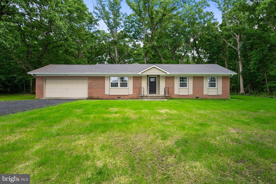 Buyer Financing Fell Through- their loss is your gain!! 
Welcome to this stunning rambler-style home, situated on over 2.5 level acres. Completely renovated, you'll immediately appreciate the seamless flow of the open floor plan, designed to maximize both space and natural light. The heart of the home is undoubtedly the gorgeous kitchen, featuring sleek granite countertops, custom backsplash, and stainless steel appliances. An expansive island provides ample workspace and doubles as a casual dining area, perfect for morning coffee or entertaining guests. Recessed lighting overhead illuminates the space, enhancing its warmth and inviting atmosphere. Adjacent to the kitchen, the dining area offers a cozy spot for enjoying meals. For larger gatherings or cozy evenings in, the generous family room provides ample space to relax and unwind, complete with large windows overlooking the private acreage. Retreat to the tranquil primary suite, boasting an attached bath adorned with custom tiles and modern fixtures. Two additional bedrooms offer versatility and comfort. Convenience is key with a full laundry room, equipped with additional pantry storage space, making chores a breeze. Outside, the property is a haven of serenity, offering endless possibilities for outdoor enjoyment and recreation. Whether you're hosting summer barbecues, tending to the garden, or simply enjoying the vast expanse of greenery, this outdoor oasis is sure to inspire. With a 2-car garage providing shelter for your vehicles and storage needs, and its convenient proximity to shopping, dining, and other amenities, this home offers the perfect blend of modern luxury and peaceful countryside living. Don't miss the opportunity to make this property your own retreat from the everyday hustle and bustle.