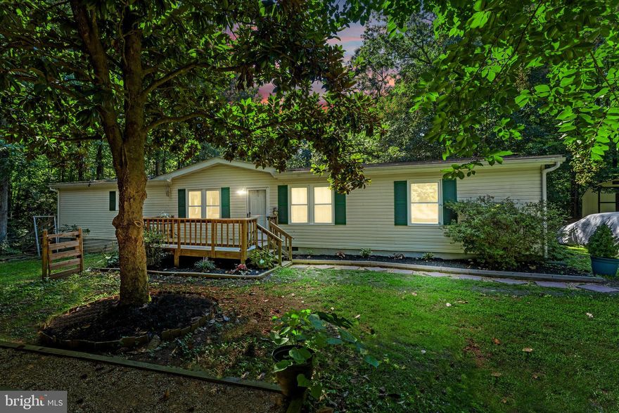 Beautifully well maintained 3 bedroom, 2 bathroom home on 5 ACRES! This home features new carpet, neutral paint, LVP flooring, huge kitchen, wood burning fireplace, 30 amp RV hookup outlet, and a large deck for entertaining. Conveniently located near Cosner’s corner, I-95, shopping, and restaurants. Schedule a showing today!